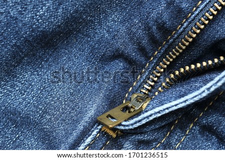 Abstract fabric texture of blue jeans or denim background.