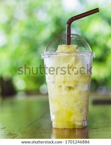 Healthy fresh kiwi smoothie with blur background
