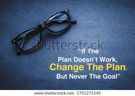 IF THE PLAN DOESN'T WORK, CHANGE THE PLAN, BUT NEVER THE GOAL with Eye Glasses or spectacle on black background. Selective focus
