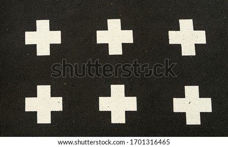 white cross pattern on carpet floor