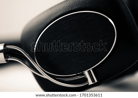 Black leather headphones on a white background