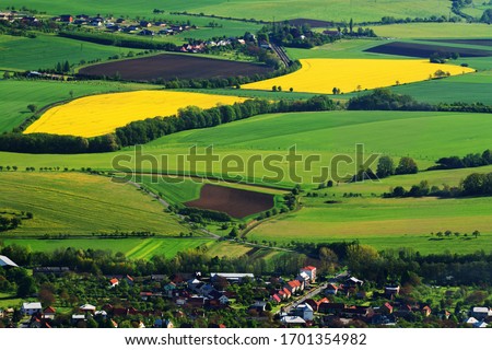 Rapeseed fields on Zahori. View from the ruins of Saumburg Castle. Rajnochovice. Hostyn hills.  Czechia. Europe.