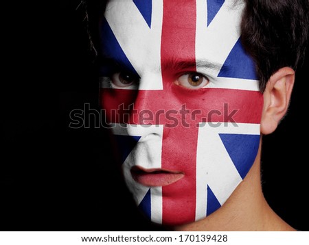 Flag of Great Britain Painted on a Face of a Young Man