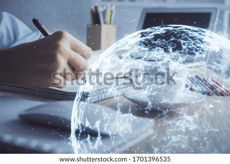 Social network theme hologram over woman's hands writing background. Concept of international people connect. Double exposure