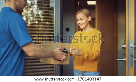Beautiful Young Woman Opens Doors of Her House and Meets Delivery Man who Gives Her Cardboard Box Postal Package. Beautiful Private House.