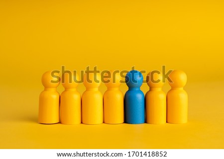 Business & HR global wood puzzle concept for leadership and team with peg doll  Royalty-Free Stock Photo #1701418852