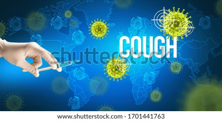 Close-up view of doctor's hand in a white glove holding syringe with COUGH inscription, coronavirus antidote concept