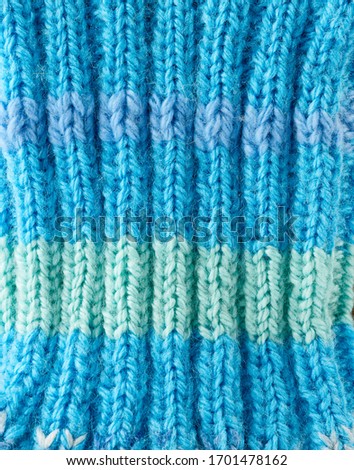 knitted blue texture, full frame, warm clothing, close up