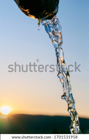 soft water on a background of blue sky
