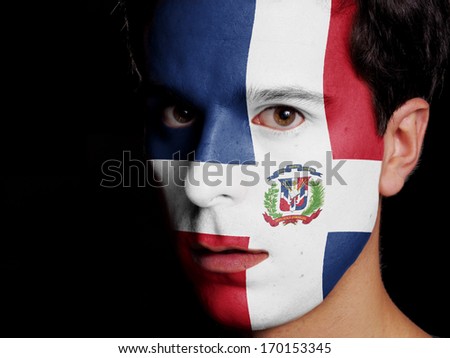 Flag of Dominican Republic Painted on a Face of a Young Man