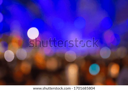 Bright laser light concert background large group of people enjoying party having fun in active night life music star performance