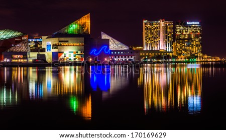 The Legg Mason Building and National Aquarium at night, in the Inner Harbor of Baltimore, Maryland.
