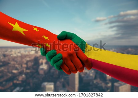 Shaking hands China and Benin