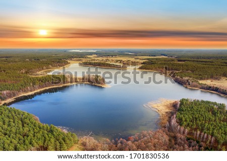 spring sunset in Masuria in north-eastern Poland Royalty-Free Stock Photo #1701830536