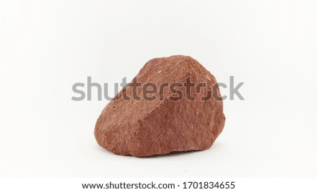 A stone placed on a white background