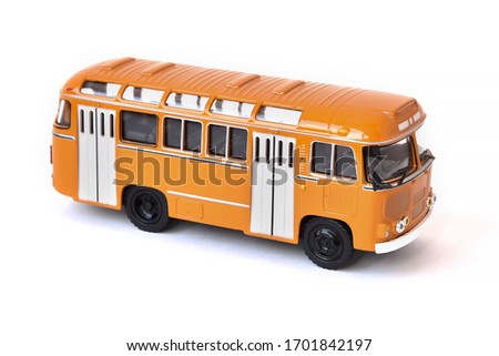 Scale model of a yellow Russian bus. Toy yellow bus Royalty-Free Stock Photo #1701842197