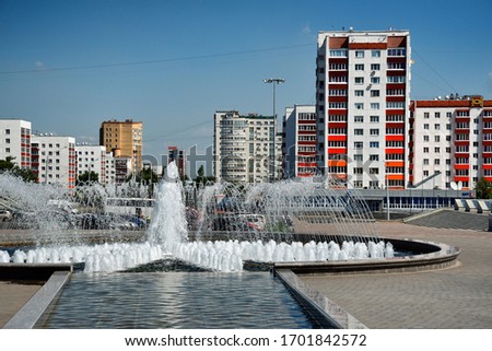 Ufa, a square with a fountain next to the monument to Salavat Yulaev Royalty-Free Stock Photo #1701842572