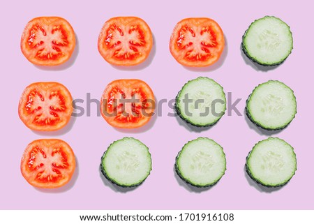 cucumbers and tomatoes cut into slices