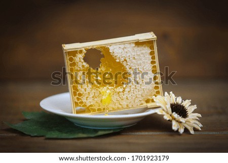 Healthy Breakfast with honeycomb  a wooden background