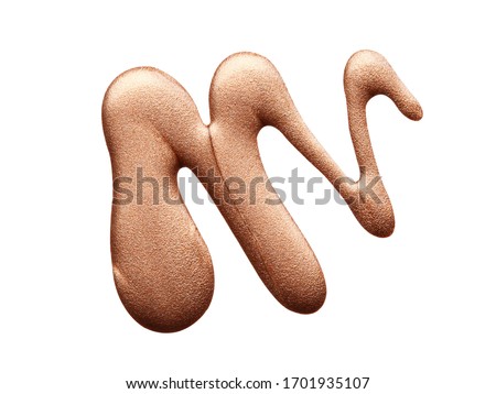 Blot of bronze nail polish isolated on white background. Photo. Top view Royalty-Free Stock Photo #1701935107