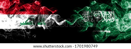 Iraq, Iraqi vs Saudi Arabia, Arabian smoky mystic flags placed side by side. Thick colored silky smokes flags together