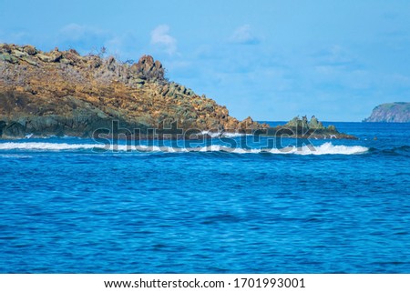 St. Thomas United States Virgin Islands, Royalty free Ocean background, Caribbean beach vacation, Rocky tropical coastline, Tranquil Ocean Landscape