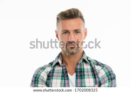Perfect fringe. Styling fringe requires that you apply some pomade or wax and comb hair forward. Fringe hairstyles allow hair volume. Handsome mature man with stylish hairstyle. Barber salon. Royalty-Free Stock Photo #1702008325