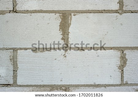 Wall of building blocks. Gas block. Background and texture