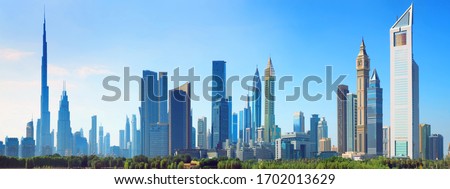 Dubai - skyline at sunrise of Dubai business center, United Arab Emirates