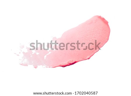 Tint or blusher, lip balm pink red smudge isolated on white texture Royalty-Free Stock Photo #1702040587