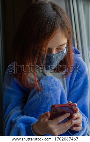 Girl in a medical protective mask. Coronavirus epidemic. Conceptual image. Symbol. Stop the virus. Protective equipment.