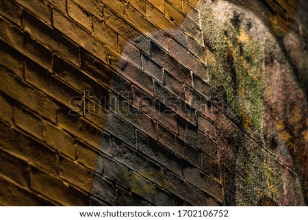 Closeup on colorfully painted brick abstract texture background with detail.