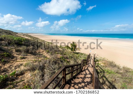 Cable Beach steps on a beautiful dry season day Royalty-Free Stock Photo #1702186852