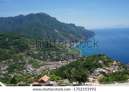 A landscape picture of a town on the coast in Southern Italy