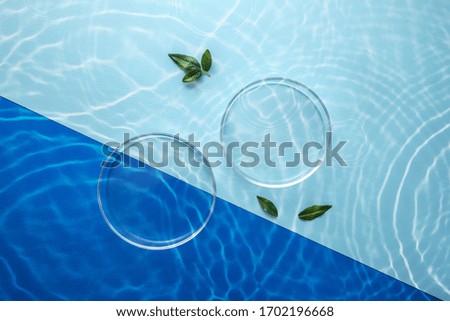 
Flask in water. ripples. Water surface Royalty-Free Stock Photo #1702196668
