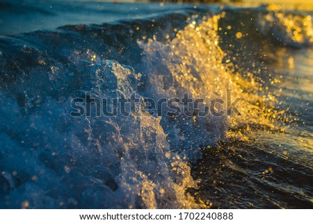 waves at sea at sunrise