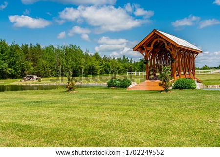 Beautiful wooden overpass cross bridge on a sunny day with blue sky and white clouds