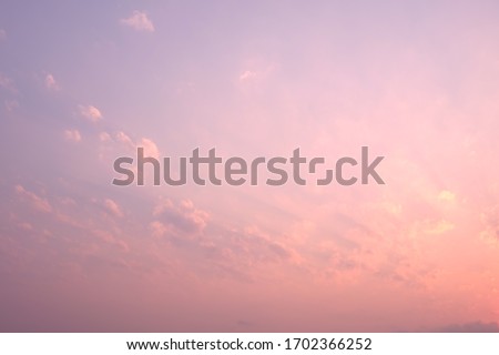 Pink cloud sky in morning sunrise Royalty-Free Stock Photo #1702366252