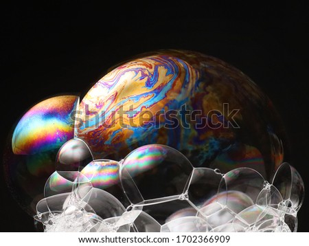 Colorful Bubble soap with selective black background