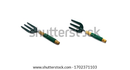 Cultivator fork on a white background,with clipping path Royalty-Free Stock Photo #1702371103