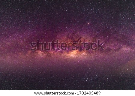 Night scenery with colorful and light yellow Milky Way Full of stars in the sky in summer Beautiful universe Background of space