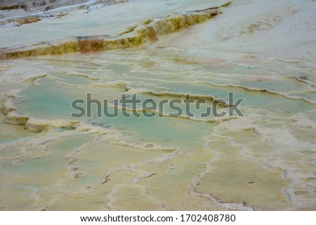 Natural travertine pools and terraces in Pamukkale. Cotton castle in southwestern Turkey. The site is a UNESCO World Heritage Site.