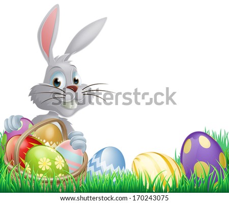White Easter eggs bunny peeking over a basket of chocolate Easter eggs