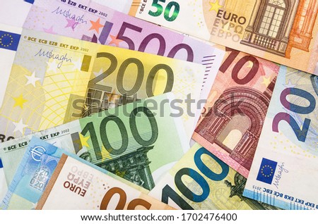 different euros for background. View from above. Royalty-Free Stock Photo #1702476400