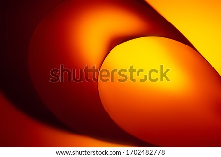 Macro photo. Abstract minimalistic background - paper art. Waves, paper cut. Single Frame from sheets of paper illuminated by neon light. Minimalism, copyspace. 3D effect. 