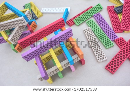 Educational and logical games for children. Bright interesting modern childrens colorful beautiful constructor background.  Creative and educational concept. Eco-friendly building blocks