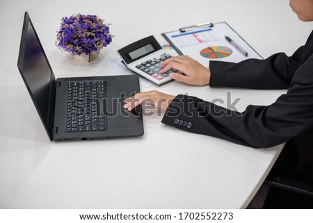 Business girl working on Desk office business financial accounting calculate, Graph analysis, business planning.