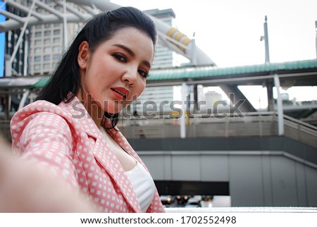 Beautiful Asia young business woman smile portrait and selfie photo for relaxation free time.