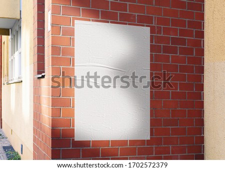 White wrinkled poster template. Glued paper mockup. Blank wheatpaste on textured wall. Empty street art sticker mock up. Clear urban glued advertising canvas. Royalty-Free Stock Photo #1702572379
