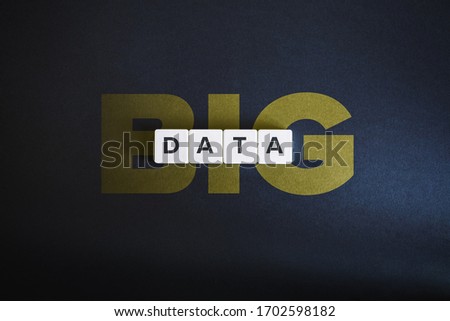 Big data analysis concept. Block letters on black background. High resolution photography.